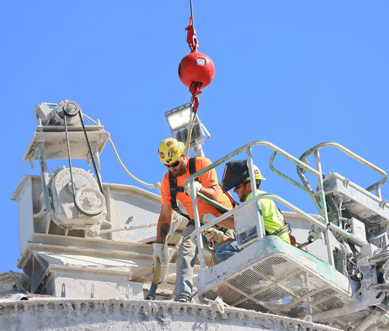 man on crane in hard hat