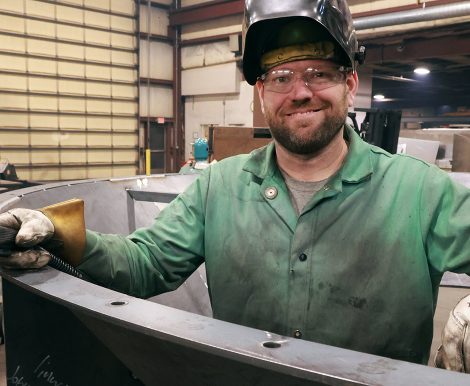 Man with hardhat smiling